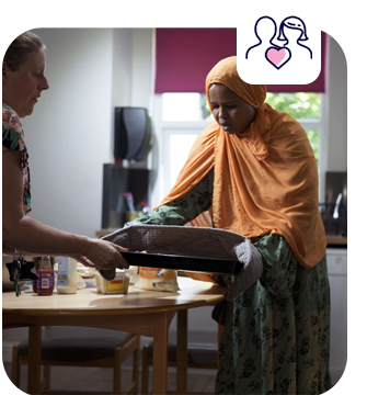 Tenant receiving support in the kitchen at The Fallowfield Project