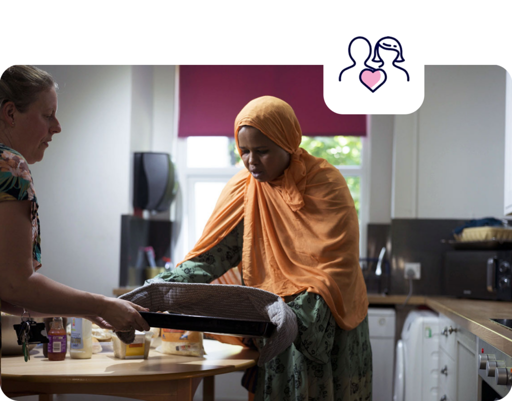 Tenant receiving support in the kitchen at The Fallowfield Project
