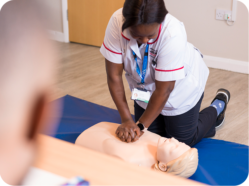 Student nurse demonstrating CPR