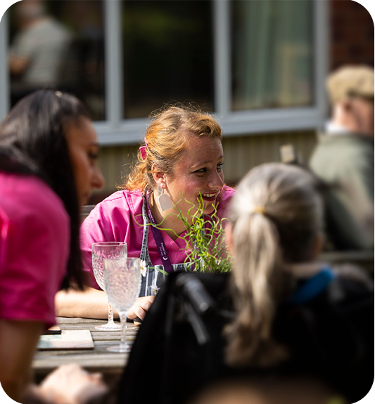 Moston Grange outdoor breakfast with staff and service users